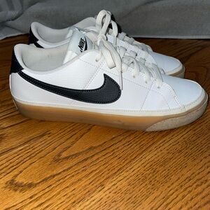 Nike Men’s White Leather Sneakers with Black Swoosh and Gum Outsole